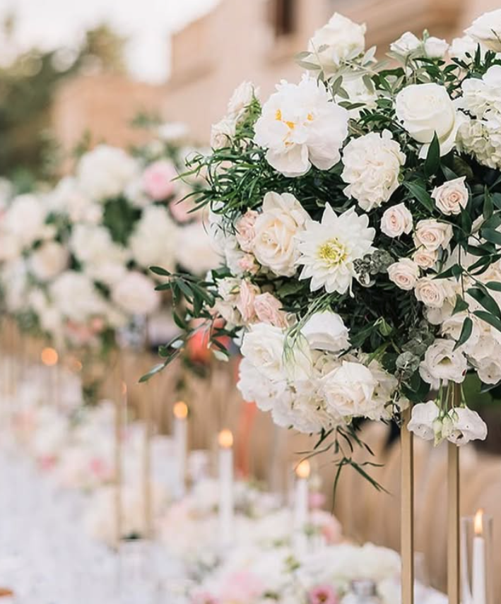 White garden roses, raised on gold